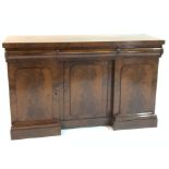 A REGENCY MAHOGANY SIDEBOARD, WITH THREE CUSHION DRAWERS