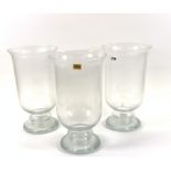 A GROUP OF THREE MODERN GLASS HURRICANE VASES (3)