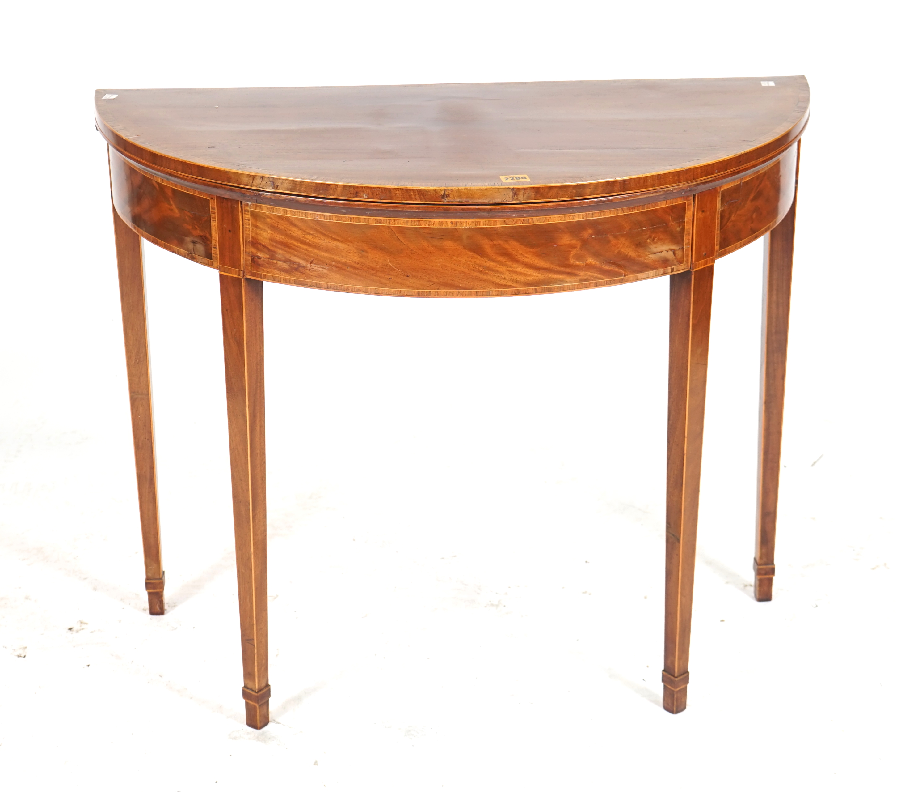 A GEORGE III MAHOGANY FOLDOVER CARD TABLE