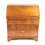 A GEORGE III OAK BUREAU