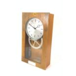 ‘BURK’ A MID-20TH CENTURY OAK WALL CLOCK