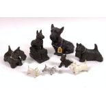 A GROUP OF EIGHT MOSTLY MODERN PAINTED METAL FIGURES OF DOGS (8)