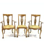 A SET OF EIGHT CONTINENTAL WALNUT DINING CHAIRS (8)