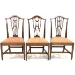 A SET OF FOUR EARLY 19TH CENTURY MAHOGANY SHIELD BACK DINING CHAIRS (4)