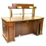 A MID-20TH CENTURY OAK AND BRASS BANK CLERKS DESK