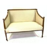 AN EDWARDIAN MAHOGANY TWO SEATER SOFA