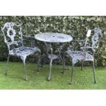 A MODERN BLACK PAINTED ALUMINIUM CIRCULAR GARDEN TABLE (3)