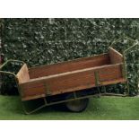 A 20TH CENTURY PINE AND METAL GARDEN TROLLEY