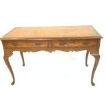 A GEORGE II STYLE WALNUT TWO DRAWER SIDE TABLE
