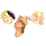 TWO CERAMIC WALL MASKS AND A PLASTER MASK SIGNED COLLINS