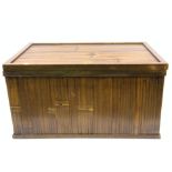 A MODERN BAMBOO LIFT TOP TRUNK