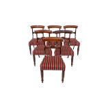 A SET OF SIX REGENCY ROSEWOOD AND MAHOGANY DINING CHAIRS (6)