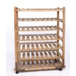 AN EARLY 20TH CENTURY PINE SEVEN TIER BAKERS COOLING RACK