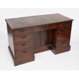 A GEORGE II MAHOGANY KNEEHOLE WRITING DESK