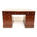 A LATE 19TH CENTURY MAHOGANY NINE DRAWER PEDESTAL DESK