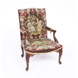 A GEORGE III CARVED MAHOGANY OPEN ARMCHAIR