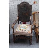 A 17TH CENTURY FLEMISH STYLE EMBOSSED LEATHER CARVED MAHOGANY FRAMED OPEN ARMCHAIR