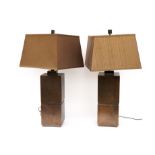 A PAIR OF BRONZE PATINATED METAL LAMPS (2)