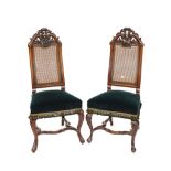 A MATCHED PAIR OF 18TH CENTURY DUTCH CARVED WALNUT SIDE CHAIRS (2)