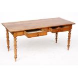 A 19TH CENTURY FRENCH PLANK TOP FRUITWOOD KITCHEN TABLE