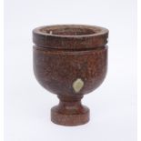 A 19TH CENTURY ROUGE MARBLE MORTAR WITH INTEGRAL DRAIN HOLE