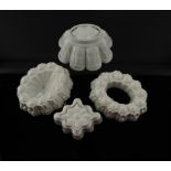 SHELLEY POTTERY: FOUR WHITE CERAMIC JELLY MOULDS (4)