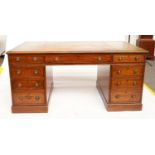 A LATE 19TH CENTURY MAHOGANY NINE DRAWER PEDESTAL DESK