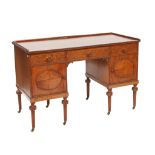 PROBABLY WARING AND GILLOW; A MID-20TH CENTURY SATINWOOD WRITING TABLE