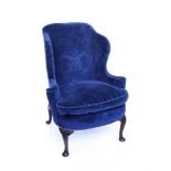 A QUEEN ANNE STYLE BLUE UPHOLSTERED WING CHAIR