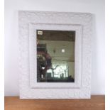 A MODERN WHITE PAINTED WALL MIRROR