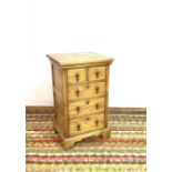 A 20TH CENTURY OAK CHEST OF FOUR SHORT DRAWERS