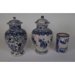 TWO CHINESE BLUE AND WHITE BALUSTER VASES AND TWO COVERS, AND A MODERN BLUE AND WHITE BRUSHPOT...