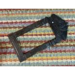 A REGENCY STYLE BROWN PAINTED PICTURE FRAME