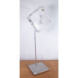 AN UNUSUAL PERSPEX MODERNIST BLOCK SCULPTURE MOUNTED ON A CHROME STAND, 70CM TALL