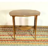 A LATE 19TH CENTURY SHAPED INLAID MAHOGANY SIDE TABLE