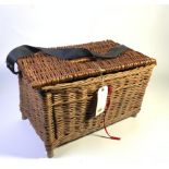 A FISHING BASKET WITH CONTENTS