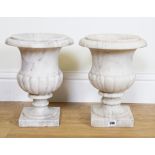 A PAIR OF MARBLE CAMPANA URNS (2)