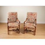 A PAIR OF 19TH CENTURY FRENCH CARVED WALNUT FRAMED SQUARE BACK OPEN ARMCHAIRS (2)