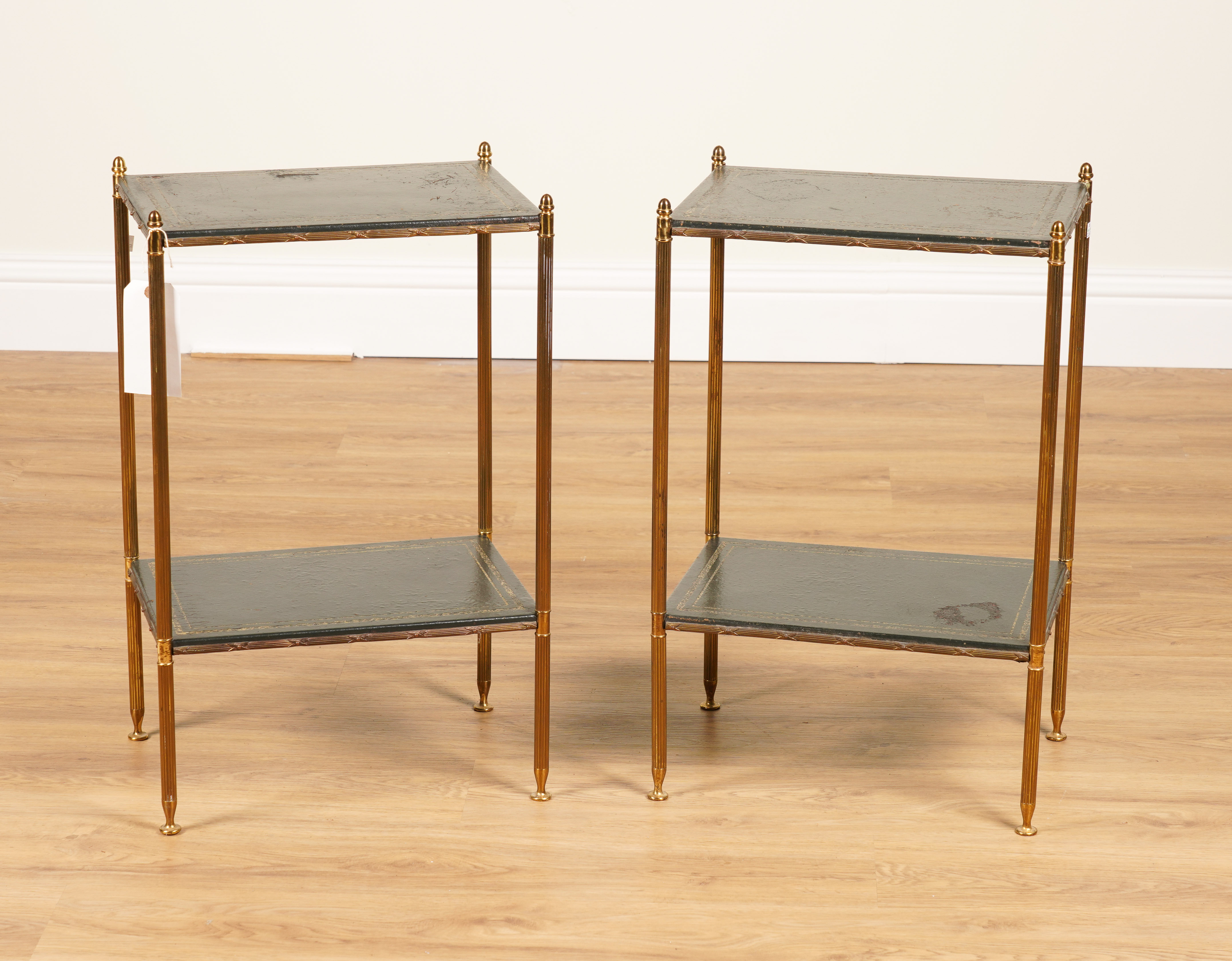 A PAIR OF MID 20TH CENTURY BRASS AND LEATHER REGTANGULAR TWO TIER ETAGERES (2)