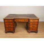 AN 18TH CENTURY STYLE CARVED MAHOGANY INVERTED BREAKFRONT PEDESTAL PARTNER’S DESK