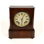 A BRASS INLAID WALNUT MANTEL CLOCK