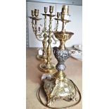 A PAIR OF BRASS THREE-LIGHT CANDELABRA AND ANOTHER TABLE LIGHT