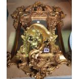 A GEORGE III STYLE GOLD PAINTED WALL MIRROR (2)