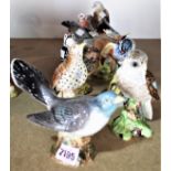 A GROUP OF SEVEN BESWICK CERAMIC FIGURES (7)