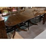 A GEORGE III STYLE MAHOGANY D-END EXTENDING DINING TABLE