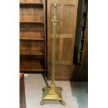 A BRASS CORINTHIAN COLUMN STANDARD LAMP