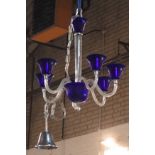A PAIR OF MODERN BLUE COLOURED GLASS SIX-BRANCH CHANDELIERS (2)