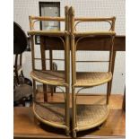 A PAIR OF MODERN BAMBOO AND RATTAN THREE TIER CORNER STANDS (2)