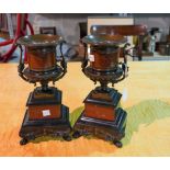 A PAIR OF LATE VICTORIAN BRONZE MOUNTED ROUGE GRIOTTE AND BLACK MARBLE URNS