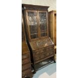 AN 18TH CENTURY STYLE OAK BUREAU BOOKCASE